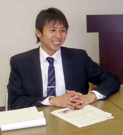 Teruki Tanaka, at his Desk