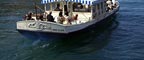 tourist boat departing Moji